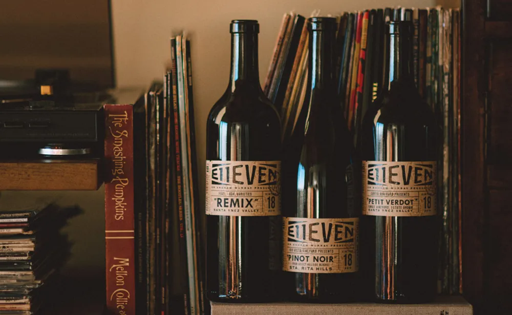 E11even wines on a bookshelf