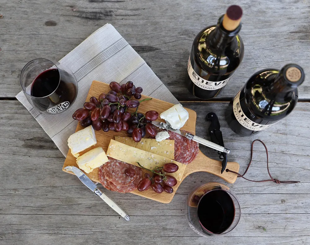 E11even wine bottles with charcuterie